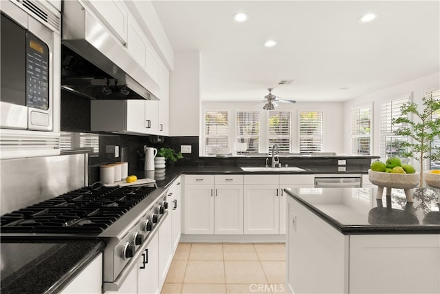 19139 Chandon Ln, Huntington Beach, CA 92648 - kitchen featuring a sink, range hood, appliances with stainless steel finishes, recessed lighting, and a ceiling fan