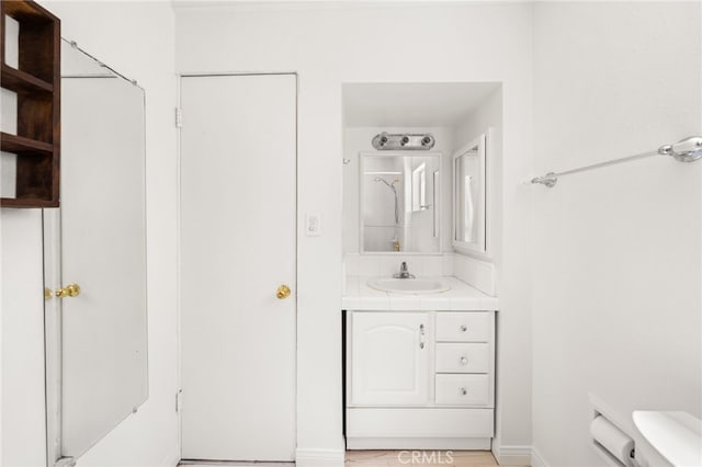 1244 Bear Springs Rd, Twin Peaks, CA 92391 - bathroom featuring vanity, toilet, and baseboards