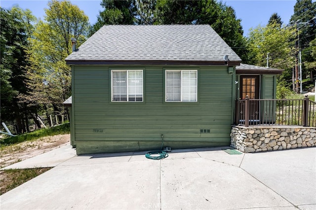 1244 Bear Springs Rd, Twin Peaks, CA 92391 - view of front of property featuring a patio area, a shingled roof, and crawl space