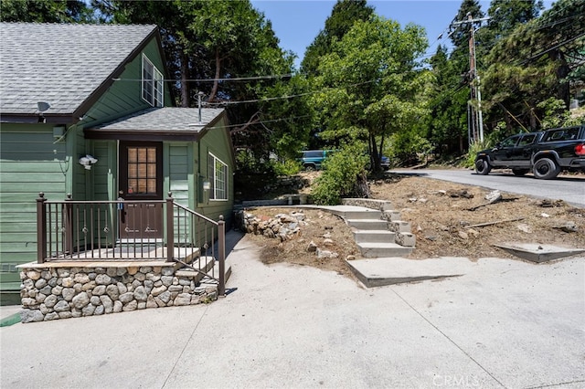 1244 Bear Springs Rd, Twin Peaks, CA 92391 - entrance to property featuring a shingled roof