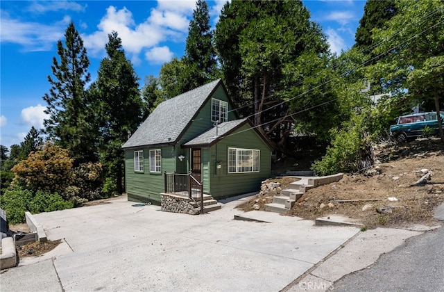 1244 Bear Springs Rd, Twin Peaks, CA 92391 - view of front of property with roof with shingles