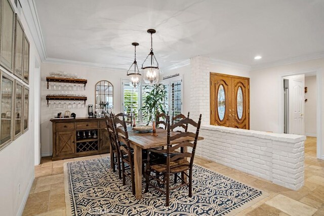 6505 Smoke Tree Ave, Oak Park, CA 91377 - dining area with stone tile flooring, a chandelier, recessed lighting, crown molding, and baseboards