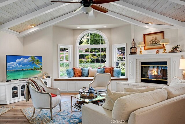 6505 Smoke Tree Ave, Oak Park, CA 91377 - living area featuring light wood finished floors, a ceiling fan, wooden ceiling, a glass covered fireplace, and recessed lighting