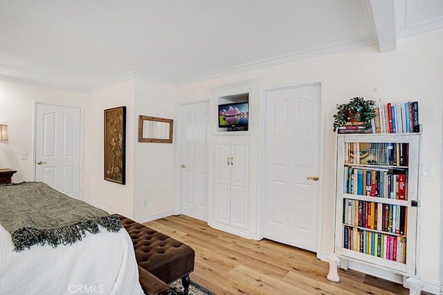 6505 Smoke Tree Ave, Oak Park, CA 91377 - bedroom with light wood-type flooring and ornamental molding