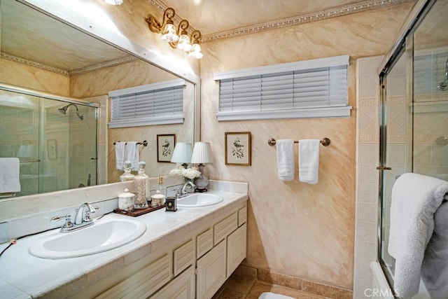 6505 Smoke Tree Ave, Oak Park, CA 91377 - full bathroom with a tile shower, double vanity, and tile patterned floors