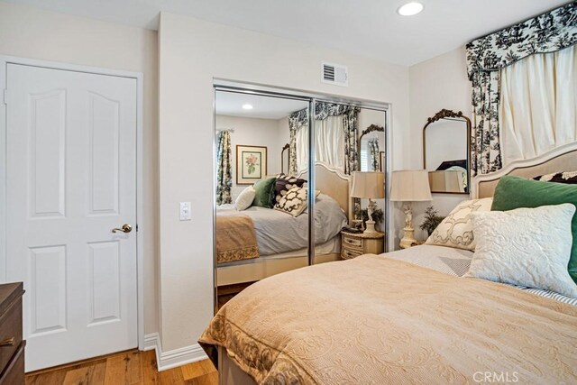 6505 Smoke Tree Ave, Oak Park, CA 91377 - bedroom with a closet, wood finished floors, recessed lighting, and baseboards
