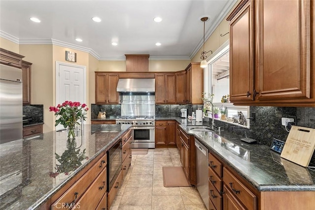 41275 Hacienda Dr, Murrieta, CA 92562 - kitchen featuring wall chimney exhaust hood, premium appliances, a sink, brown cabinets, and ornamental molding