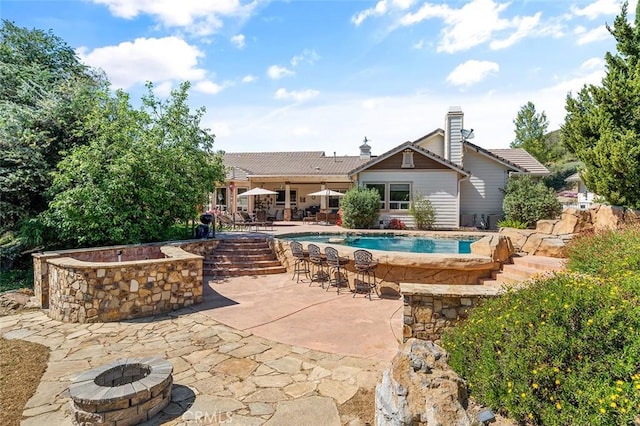 41275 Hacienda Dr, Murrieta, CA 92562 - outdoor pool featuring a fire pit and a patio
