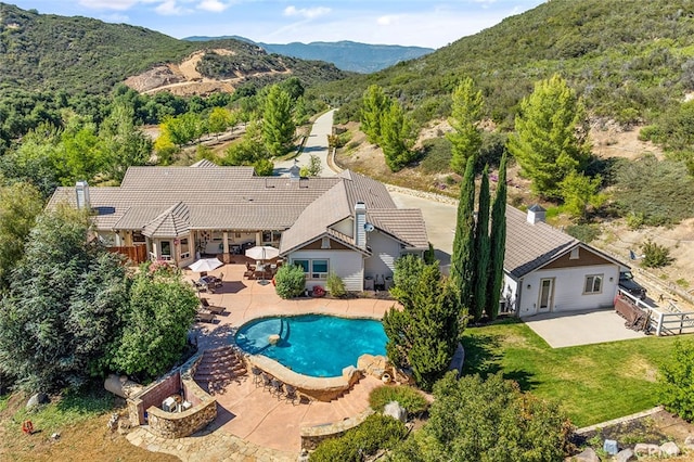 41275 Hacienda Dr, Murrieta, CA 92562 - swimming pool featuring a patio, a mountain view, and a fenced backyard