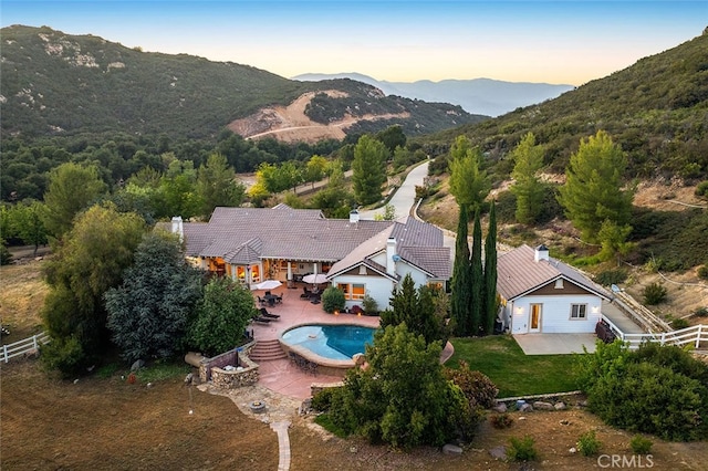 41275 Hacienda Dr, Murrieta, CA 92562 - view of subject property featuring a mountain backdrop and a pool