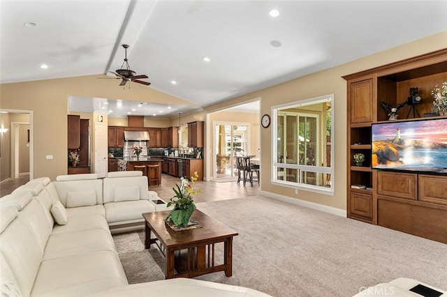 41275 Hacienda Dr, Murrieta, CA 92562 - living room with ceiling fan, vaulted ceiling, recessed lighting, baseboards, and light colored carpet
