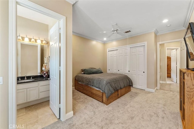 41275 Hacienda Dr, Murrieta, CA 92562 - bedroom featuring light carpet, ornamental molding, a sink, a closet, and recessed lighting