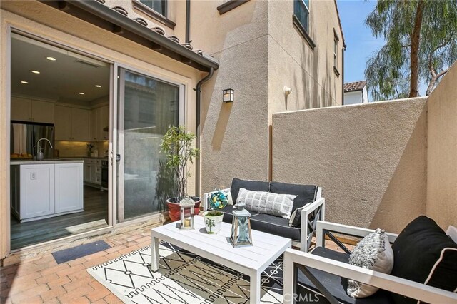 114 Desert Lotus, Irvine, CA 92618 - view of patio featuring outdoor lounge area