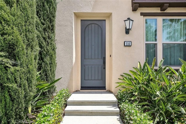 114 Desert Lotus, Irvine, CA 92618 - entrance to property with stucco siding