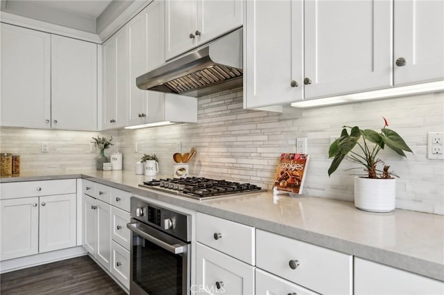 114 Desert Lotus, Irvine, CA 92618 - kitchen with appliances with stainless steel finishes, under cabinet range hood, and white cabinetry