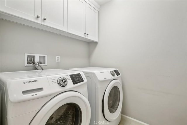 114 Desert Lotus, Irvine, CA 92618 - washroom with cabinet space, washer and clothes dryer, and baseboards