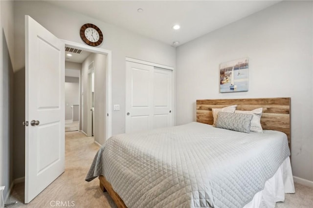 114 Desert Lotus, Irvine, CA 92618 - bedroom featuring light carpet, a closet, baseboards, and recessed lighting