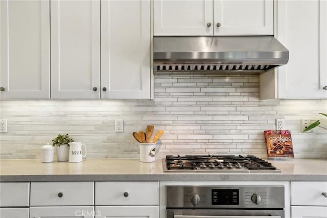 114 Desert Lotus, Irvine, CA 92618 - kitchen with exhaust hood, wall oven, and white cabinets