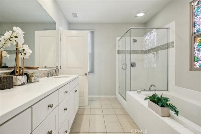 114 Desert Lotus, Irvine, CA 92618 - bathroom featuring a stall shower, a garden tub, vanity, and tile patterned floors