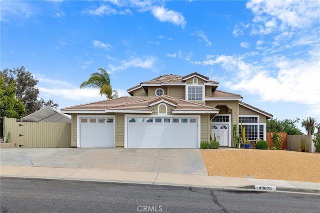 40678 Alondra Dr, Murrieta, CA 92562 - view of front of property featuring concrete driveway, a garage, and a tiled roof