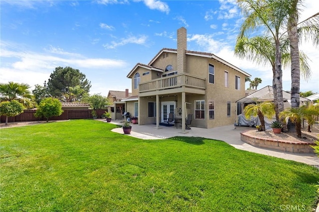 40678 Alondra Dr, Murrieta, CA 92562 - back of property featuring stucco siding, a balcony, a patio, and a chimney