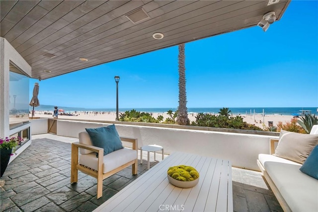 708 The Strand, Manhattan Beach, CA 90266 - view of patio / terrace with view of water and beach and an outdoor hangout area