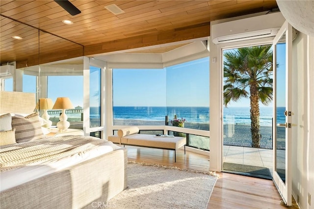 708 The Strand, Manhattan Beach, CA 90266 - sunroom featuring a water view and a wall mounted air conditioner