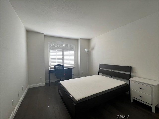21265 E Fort Bowie Dr, Walnut, CA 91789 - bedroom with dark wood finished floors and baseboards