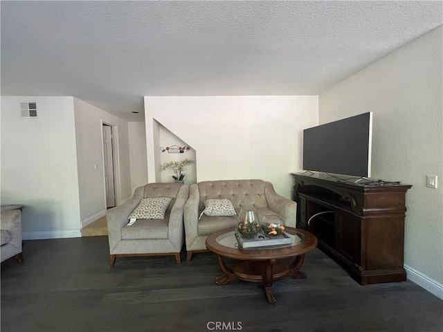 21265 E Fort Bowie Dr, Walnut, CA 91789 - living area with baseboards, wood finished floors, and a textured ceiling