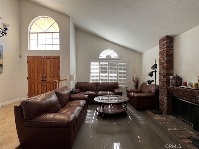 21265 E Fort Bowie Dr, Walnut, CA 91789 - living room with healthy amount of natural light, high vaulted ceiling, a brick fireplace, and baseboards