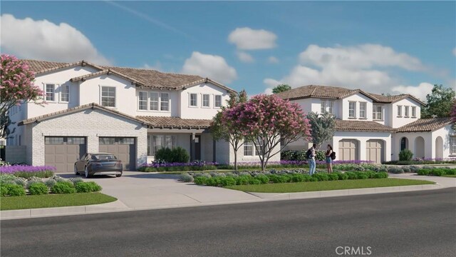 6525 Etiwanda Ave, Rancho Cucamonga, CA 91739 - mediterranean / spanish house featuring concrete driveway, a tiled roof, an attached garage, and stucco siding