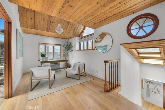 1330 8th St, Manhattan Beach, CA 90266 - living area featuring wood finished floors, vaulted ceiling, an upstairs landing, wooden ceiling, and baseboards