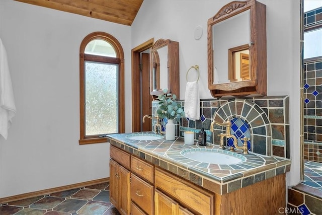 1330 8th St, Manhattan Beach, CA 90266 - full bath with double vanity, decorative backsplash, baseboards, lofted ceiling, and wood ceiling