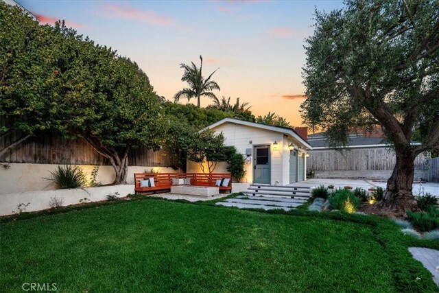 1330 8th St, Manhattan Beach, CA 90266 - back of house at dusk featuring a patio area