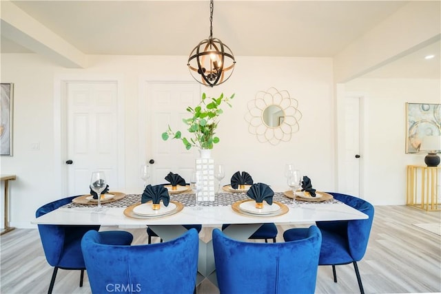 14609 Clark St, Baldwin Park, CA 91706 - dining room with light wood-style floors and a chandelier