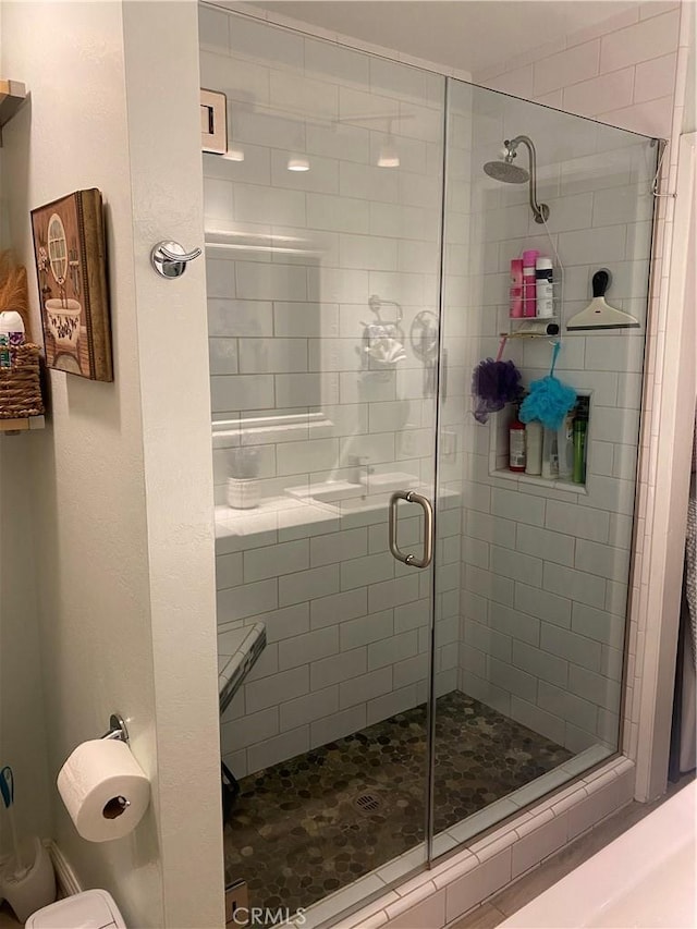 708 W Lambert Rd Unit 6, La Habra, CA 90631 - bathroom featuring a stall shower and toilet