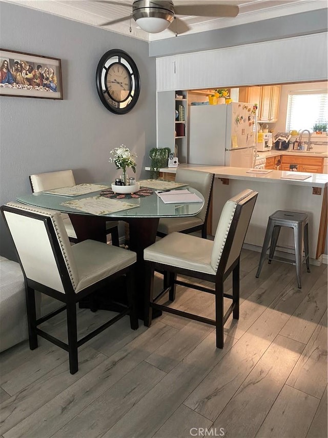 708 W Lambert Rd Unit 6, La Habra, CA 90631 - dining room featuring light wood-type flooring and a ceiling fan