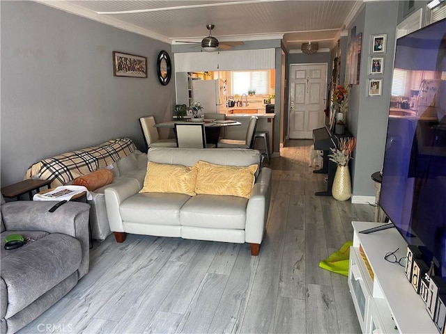 708 W Lambert Rd Unit 6, La Habra, CA 90631 - living area featuring ornamental molding, dark wood-style flooring, and ceiling fan