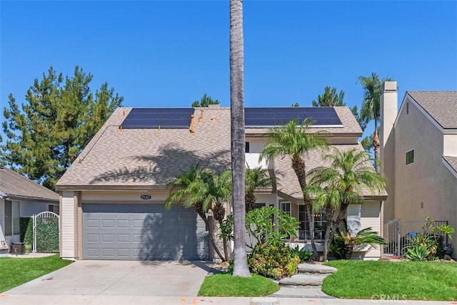 21321 Spruce, Mission Viejo, CA 92692 - view of front of property featuring an attached garage, concrete driveway, solar panels, and a shingled roof