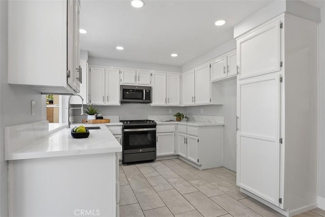 21321 Spruce, Mission Viejo, CA 92692 - kitchen with stainless steel appliances, white cabinetry, and recessed lighting