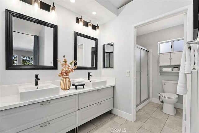 21321 Spruce, Mission Viejo, CA 92692 - full bathroom featuring double vanity, a shower stall, tile patterned floors, and recessed lighting