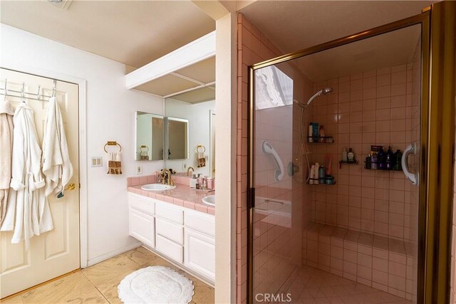 18759 Hatteras St Unit 25, Tarzana, CA 91356 - full bathroom with double vanity, a stall shower, and tile patterned flooring