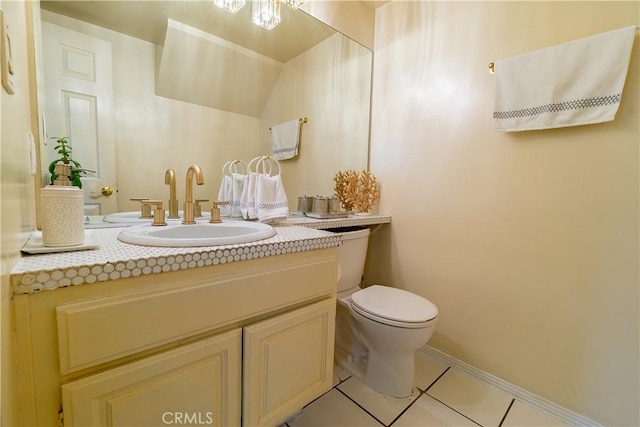 18759 Hatteras St Unit 25, Tarzana, CA 91356 - bathroom featuring vanity, toilet, baseboards, and tile patterned flooring