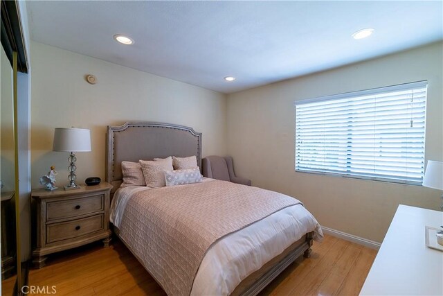 18759 Hatteras St Unit 25, Tarzana, CA 91356 - bedroom with light wood-type flooring, baseboards, and recessed lighting