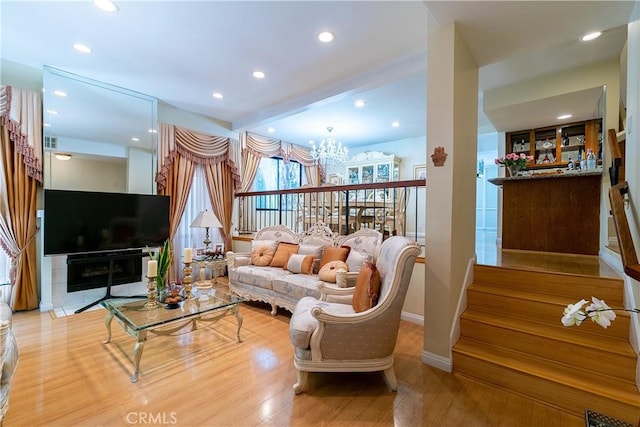 18759 Hatteras St Unit 25, Tarzana, CA 91356 - living room featuring light wood-type flooring, baseboards, recessed lighting, and a chandelier