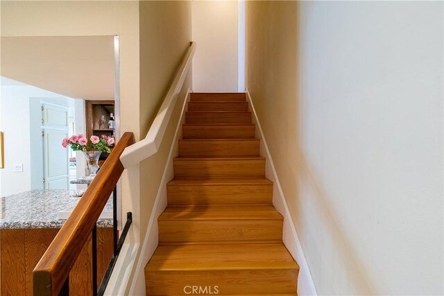 18759 Hatteras St Unit 25, Tarzana, CA 91356 - stairs featuring wood finished floors