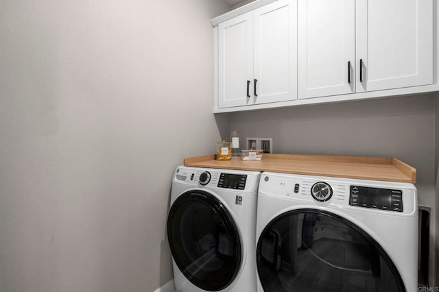 7902 Belluno Way, San Diego, CA 92126 - washroom featuring separate washer and dryer and cabinet space