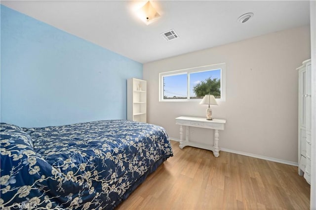 43220 51st St W, Quartz Hill, CA 93536 - bedroom with wood finished floors and baseboards