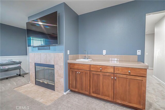28217 Alton Way, Castaic, CA 91384 - bathroom with a sink and a tiled fireplace