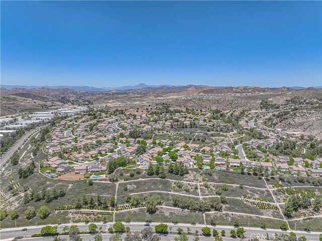 28217 Alton Way, Castaic, CA 91384 - aerial overview of property's location with a mountain backdrop and nearby suburban area